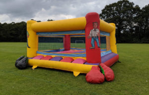 Inflatable boxing ring and giant gloves